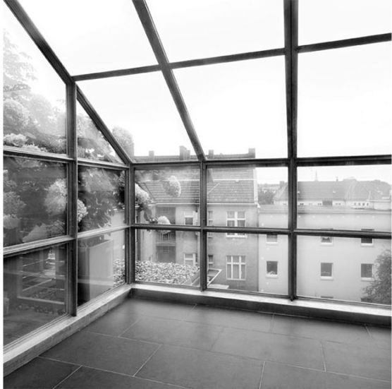 Wintergarten mit Blick über die Dächer